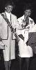 006 (263Wx500H) - Victoria Mutual Liguanea Branch Opening: A Smiling Miss Jamaica World 1983 Cathy Levy cuts the ribbon declaring open the newest Victoria Mutual Branch at the Lane Plaza in Liguanea on wednesday january 18. Looking on is Liguanea Branch Manager Mrs. Winner 