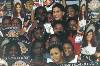 009 (500Wx334H) - Selena Delgado, Miss Jamaica World 1996 surrounded by the girls of Glenhope Place of Safety with autographed copies of the Miss Jamaica World Poster. 