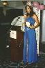 OP 15 (320Wx479H) - Michell addresses audience after Miss World Wardrobe showing. 